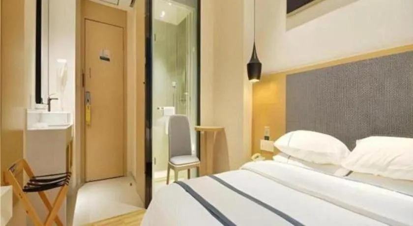 Bed in City Comfort Inn Wuhan Xinzhou Mo'er Cheng