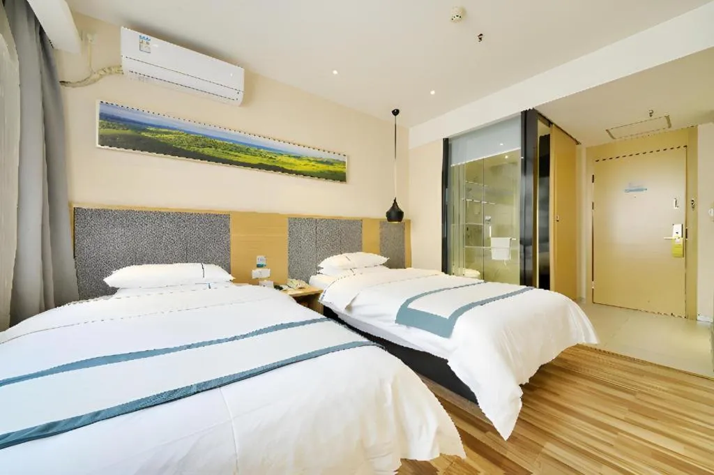 Bed in City Comfort Inn Wuhan Xinzhou Mo'er Cheng