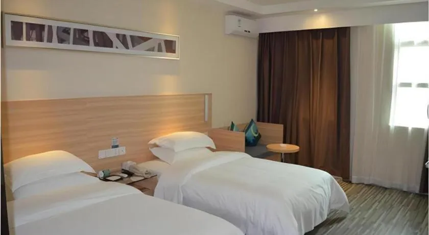 Bed in City Comfort Inn Huizhou Huiyang High-speed Railway Station