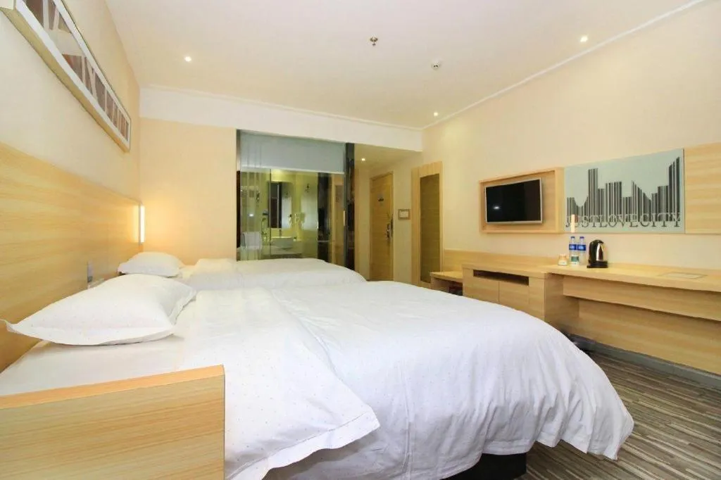 Bed in City Comfort Inn Huizhou Huiyang High-speed Railway Station