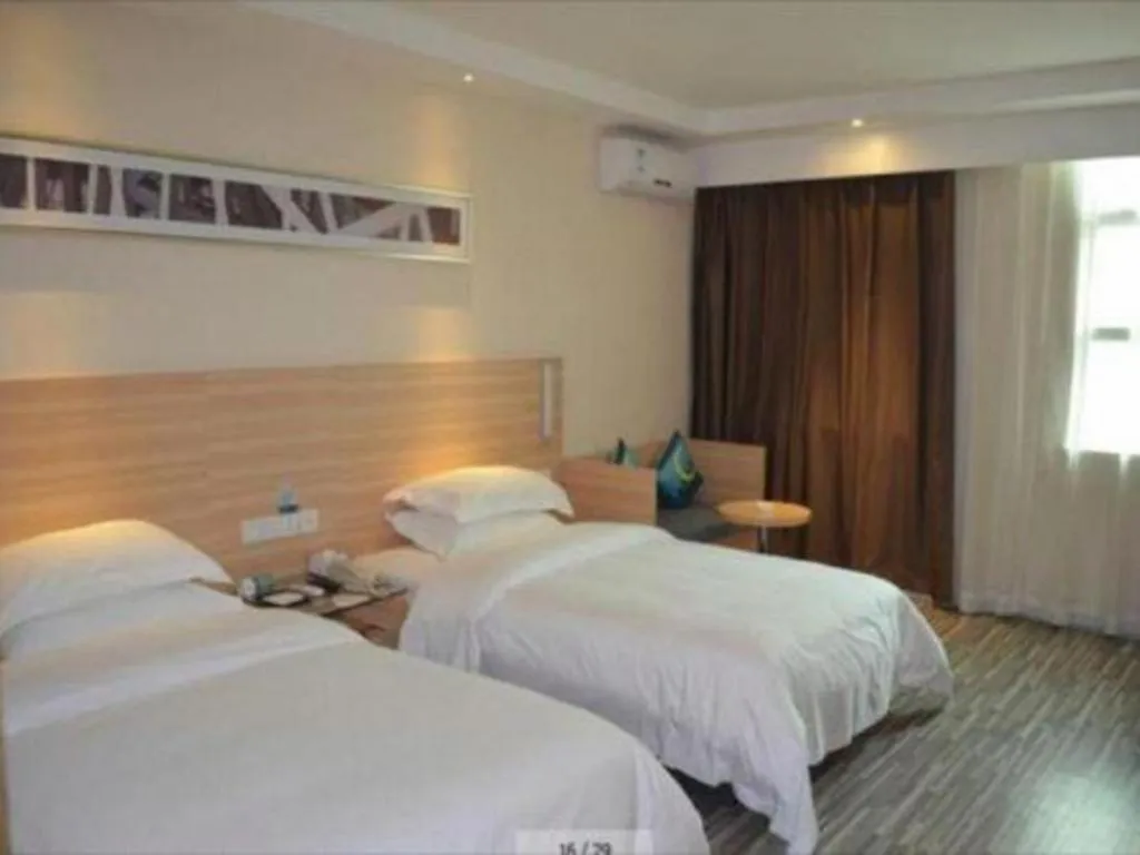 Bed in City Comfort Inn Huizhou Huiyang High-speed Railway Station
