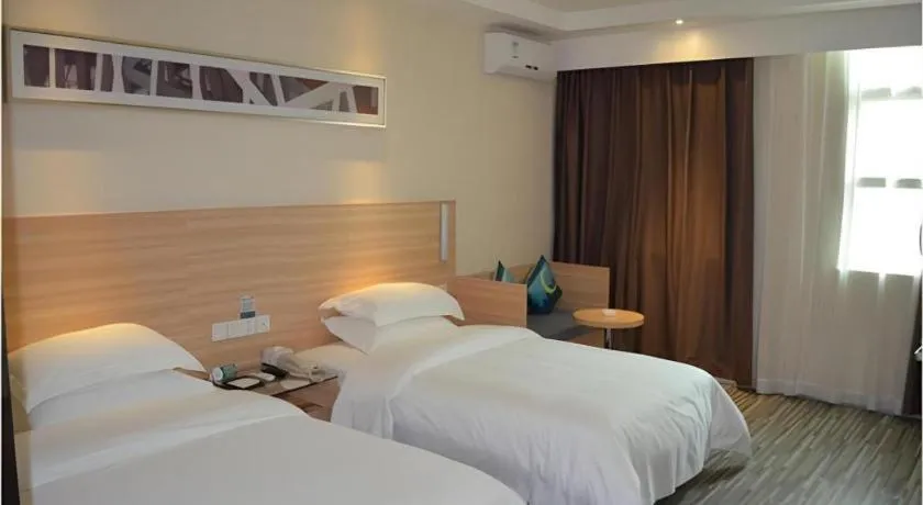 Bed in City Comfort Inn Huizhou Huiyang High-speed Railway Station