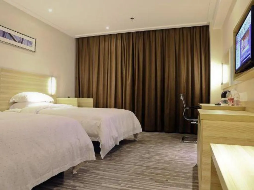 Bed in City Comfort Inn Huizhou Huiyang High-speed Railway Station