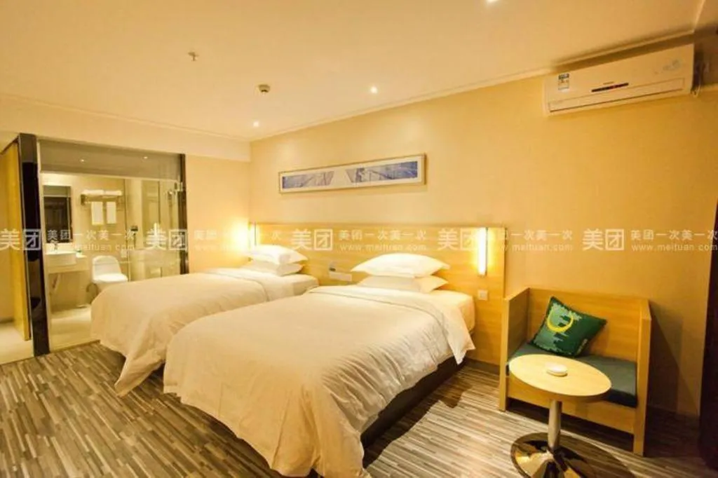 Bed in City Comfort Inn Huizhou Huiyang High-speed Railway Station