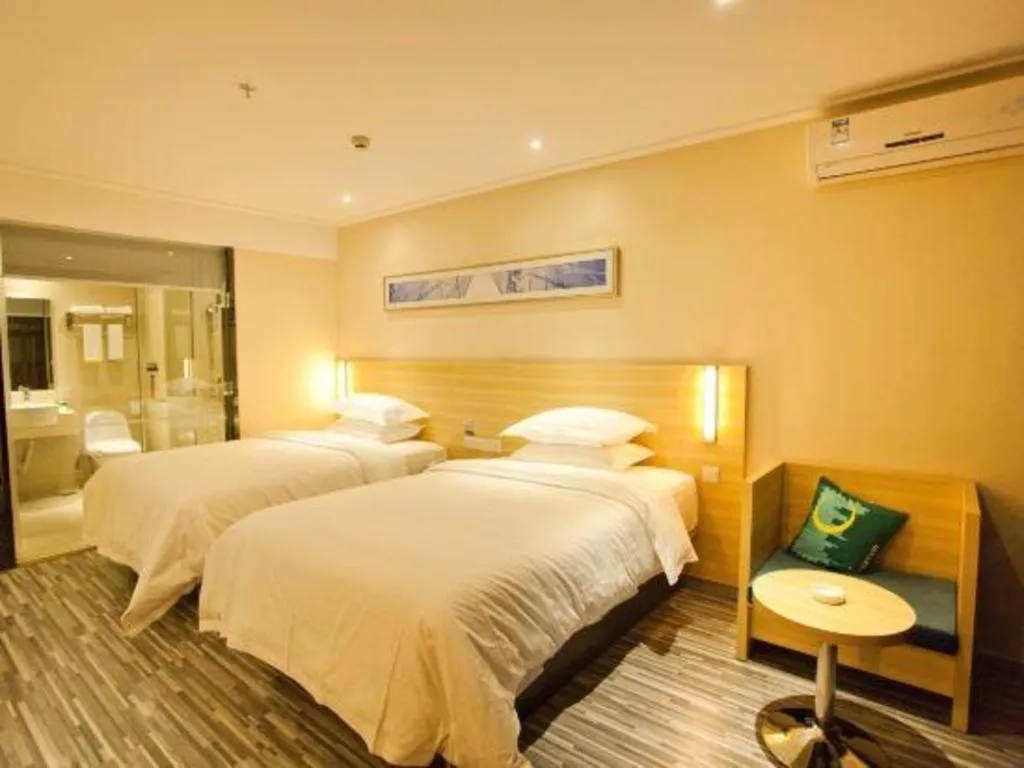 Bed in City Comfort Inn Huizhou Huiyang High-speed Railway Station