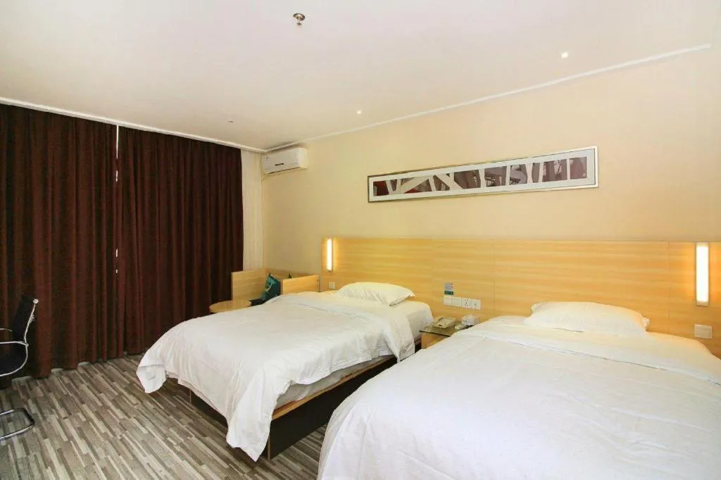 Bed in City Comfort Inn Huizhou Huiyang High-speed Railway Station
