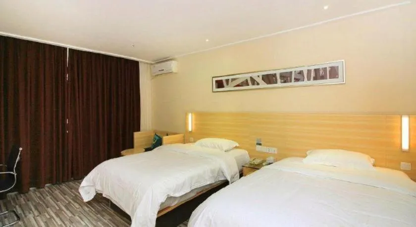 Bed in City Comfort Inn Huizhou Huiyang High-speed Railway Station