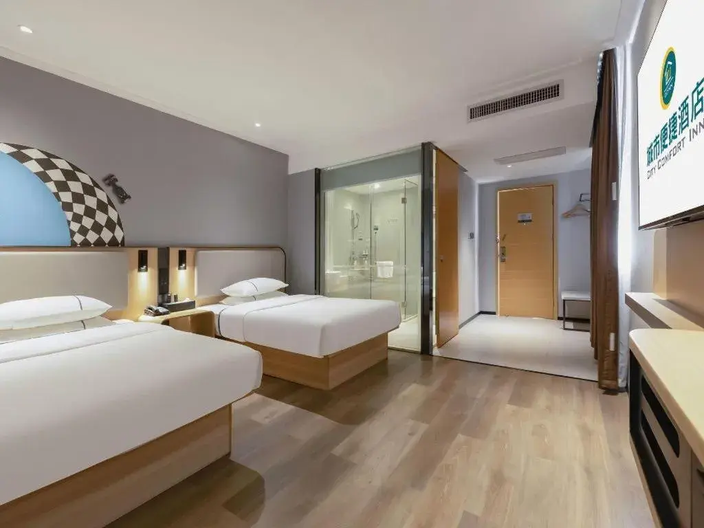 Bed in City Comfort Inn Guigang Pingnan Bus Station Jiangbin Park Bed in City Comfort Inn Guigang Pingnan Bus Station Jiangbin Park