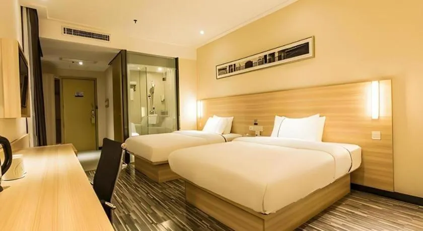 Bed in City Comfort Inn Guigang Pingnan Bus Station Jiangbin Park