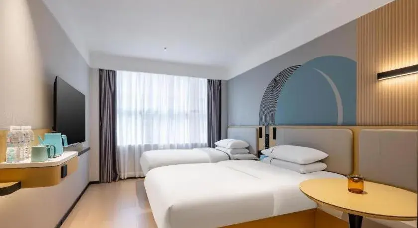 Bed in City Comfort Inn Guigang Pingnan Bus Station Jiangbin Park Bed in City Comfort Inn Guigang Pingnan Bus Station Jiangbin Park