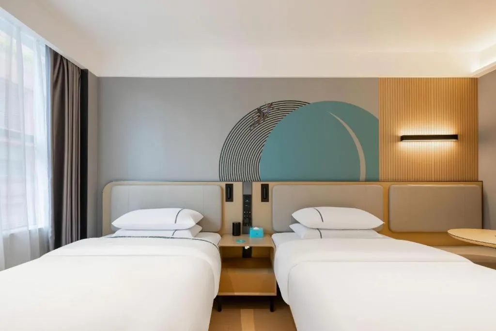 Bed in City Comfort Inn Guigang Pingnan Bus Station Jiangbin Park