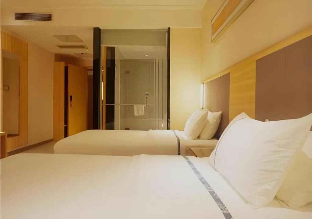Bed in City Comfort Inn Zhanjiang Middle Renmin Avenue Dingsheng Square