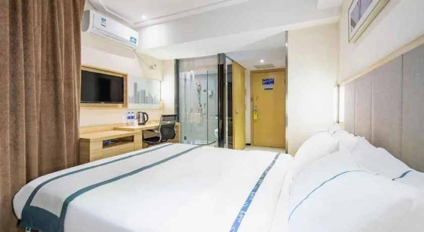 Bed in City Comfort Inn Wuzhou Arcade City Sanzongfu