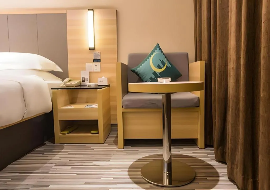 Bed in City Comfort Inn Wuzhou Arcade City Sanzongfu