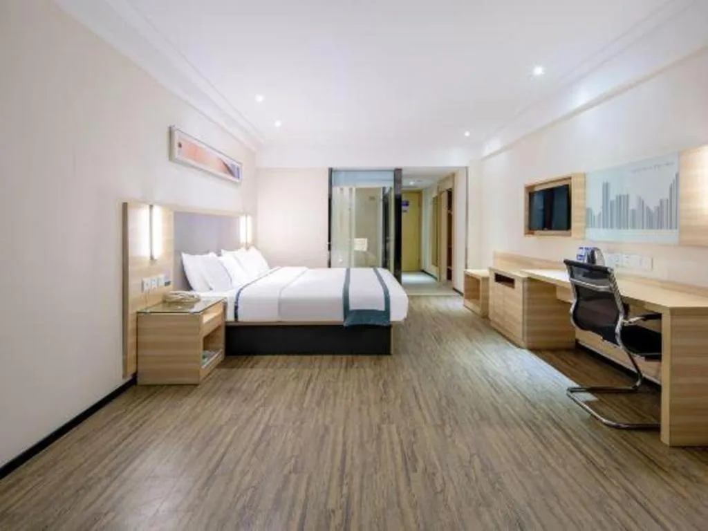 Bed in City Comfort Inn Wuzhou Arcade City Sanzongfu