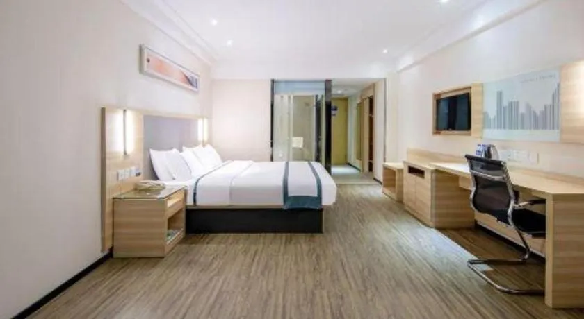 Bed in City Comfort Inn Wuzhou Arcade City Sanzongfu