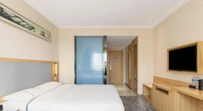 Bed in City Comfort Inn Wuzhou Arcade City Sanzongfu