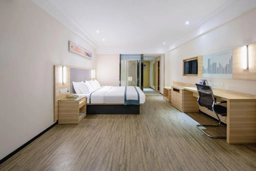 Bed in City Comfort Inn Wuzhou Arcade City Sanzongfu