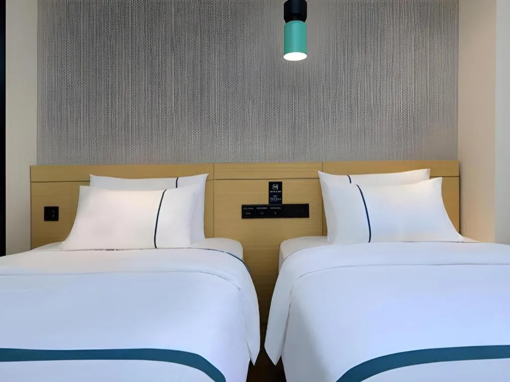 Bed in City Comfort Inn Guiyang North High Speed Railway Station