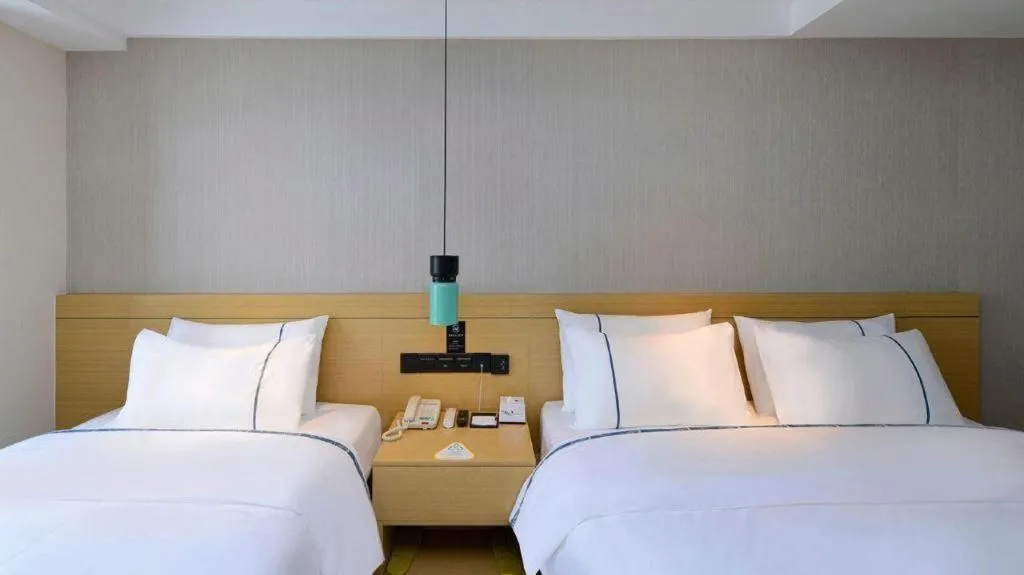 Bed in City Comfort Inn Guiyang North High Speed Railway Station