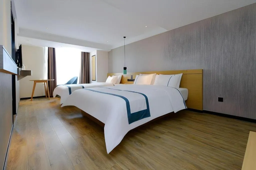 Bed in City Comfort Inn Guiyang North High Speed Railway Station