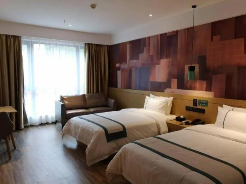 Bed in City Comfort Inn Zunyi Wuchuan