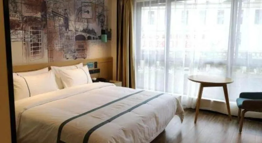 Bed in City Comfort Inn Zunyi Wuchuan