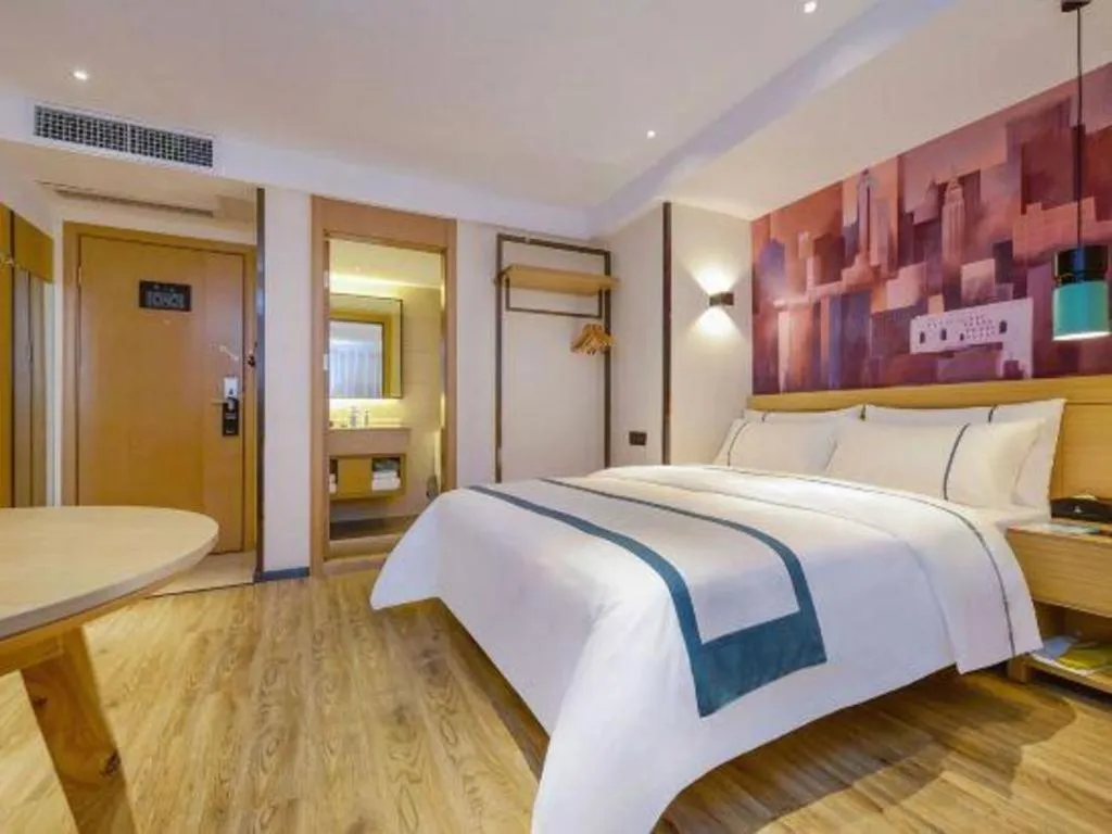 Bed in City Comfort Inn Zunyi Wuchuan
