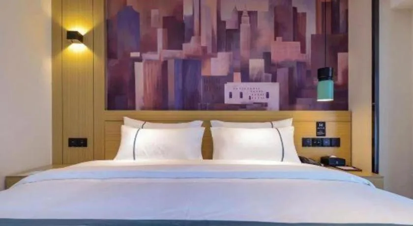 Bed in City Comfort Inn Zunyi Wuchuan