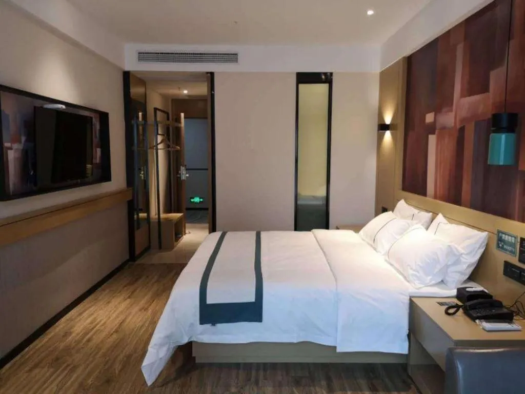Bed in City Comfort Inn Zunyi Wuchuan