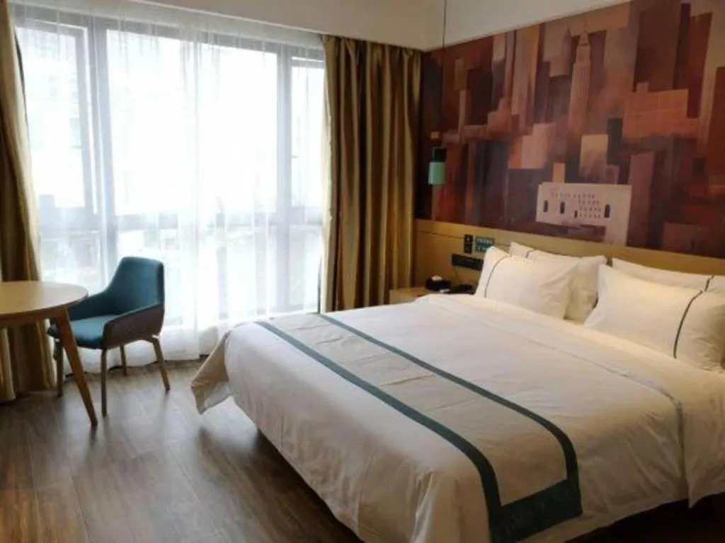 Bed in City Comfort Inn Zunyi Wuchuan