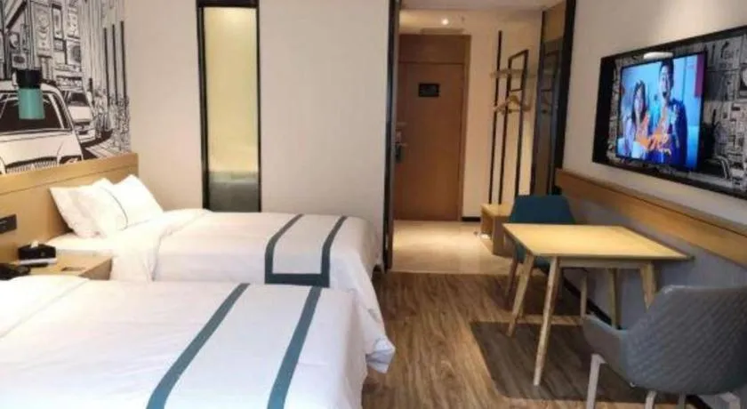 Bed in City Comfort Inn Zunyi Wuchuan