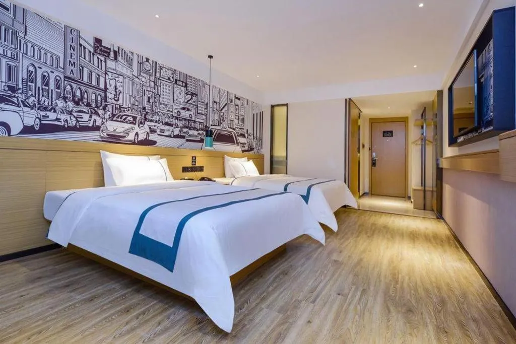 Bed in City Comfort Inn Zunyi Wuchuan