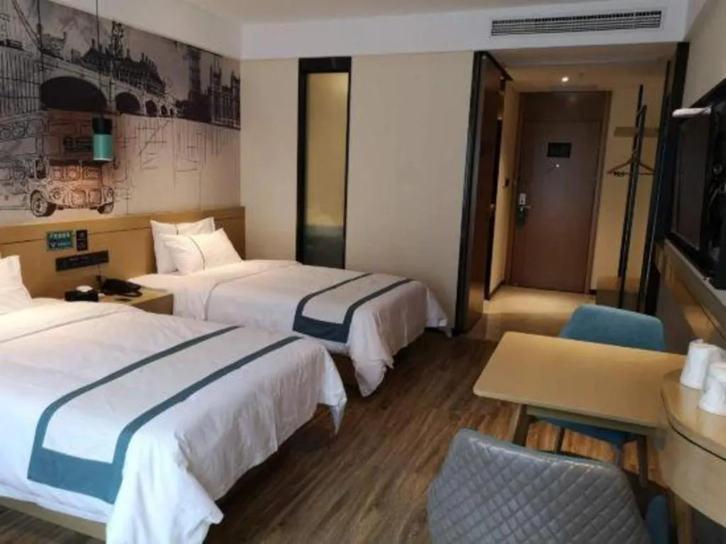 Bed in City Comfort Inn Zunyi Wuchuan