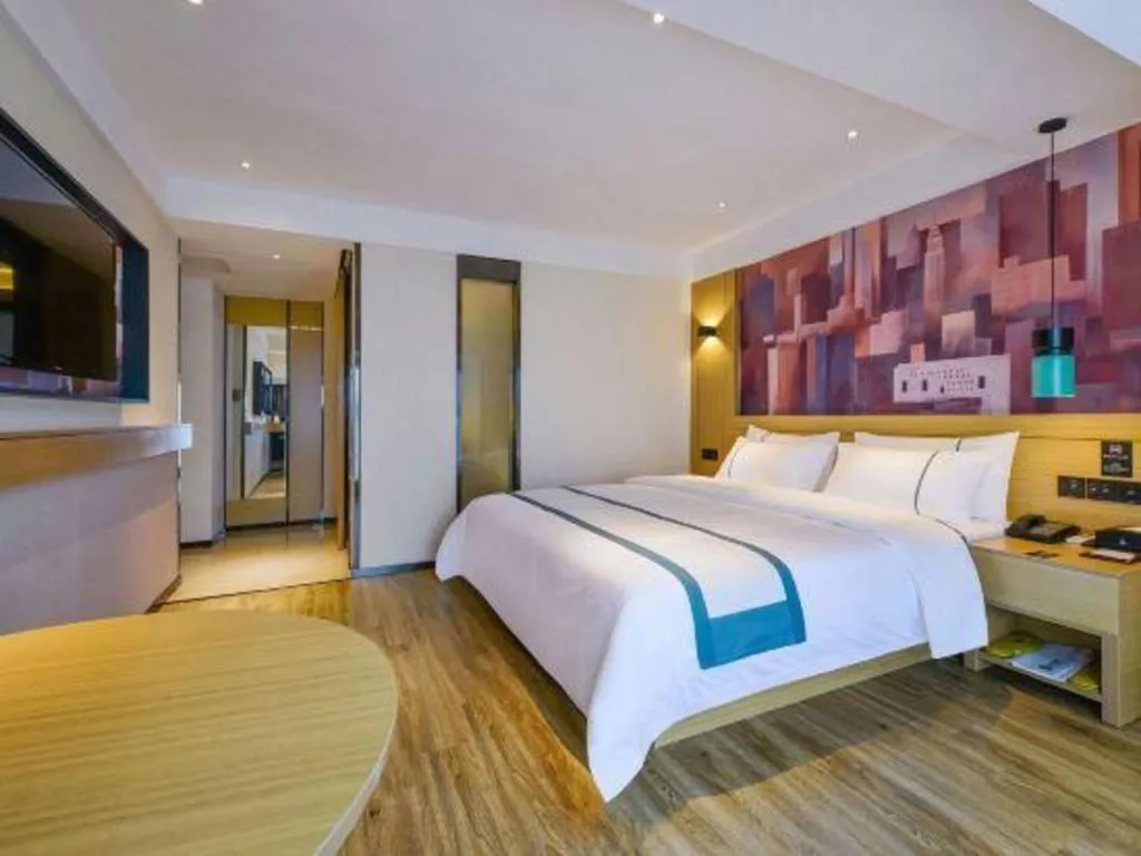 Bed in City Comfort Inn Zunyi Wuchuan