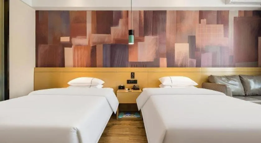 Bed in City Comfort Inn Nanning Kede Zoo Qingchuan Metro Station