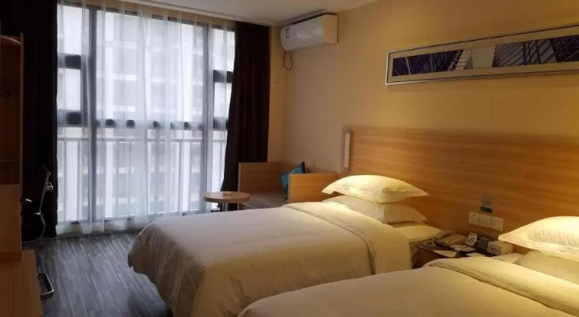 Bed in City Comfort Inn Lichuan Railway Station Tenglong Cave