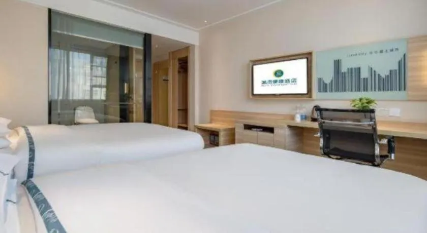 Bed in City Comfort Inn Hezhou High Speed Railway Station