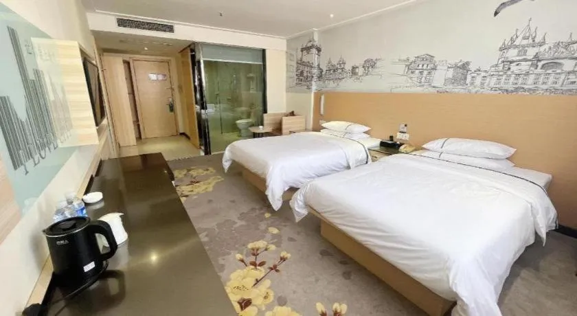 Bed in City Comfort Inn Huanggang Dongmen Road Wanda Plaza