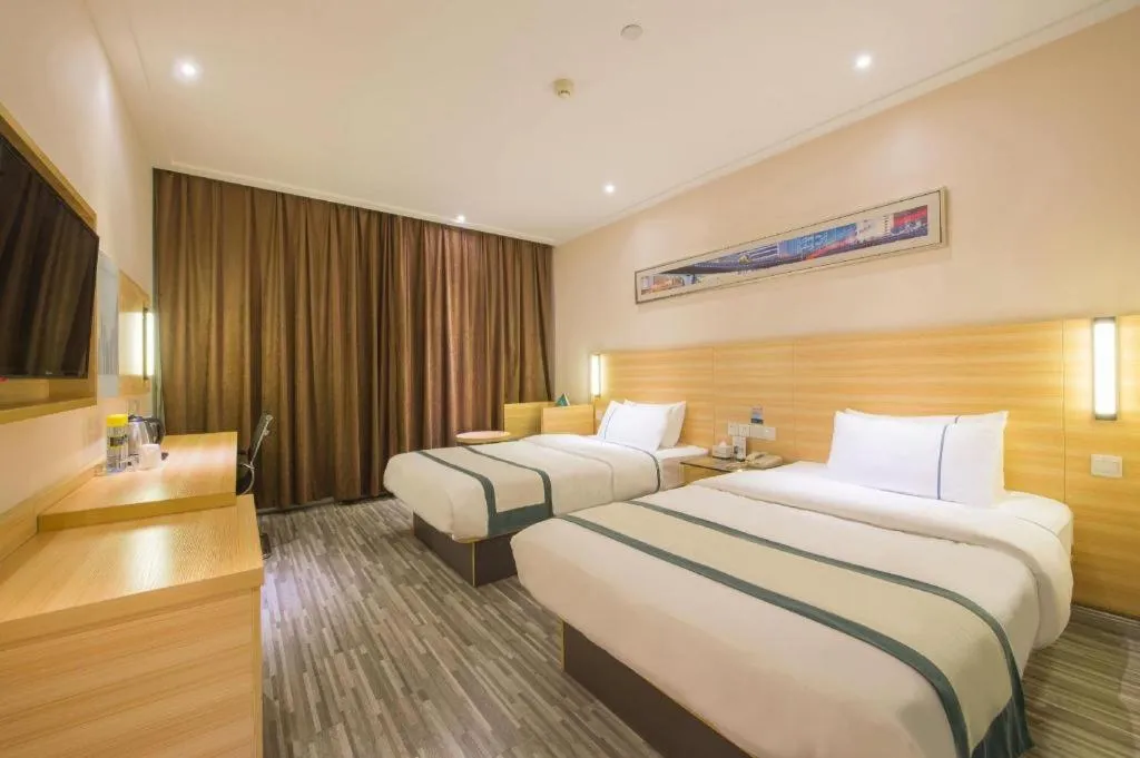 Bed in City Comfort Inn Huanggang Dongmen Road Wanda Plaza