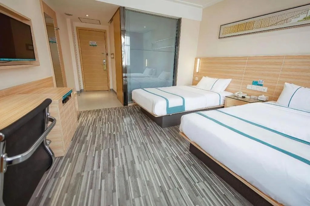 Bed in City Comfort Inn Huanggang Dongmen Road Wanda Plaza