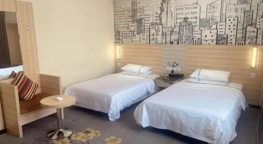 Bed in City Comfort Inn Huanggang Dongmen Road Wanda Plaza