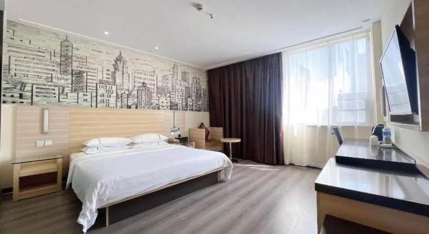 Bed in City Comfort Inn Huanggang Dongmen Road Wanda Plaza