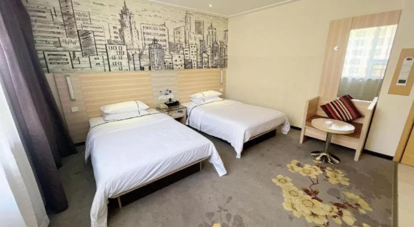 Bed in City Comfort Inn Huanggang Dongmen Road Wanda Plaza