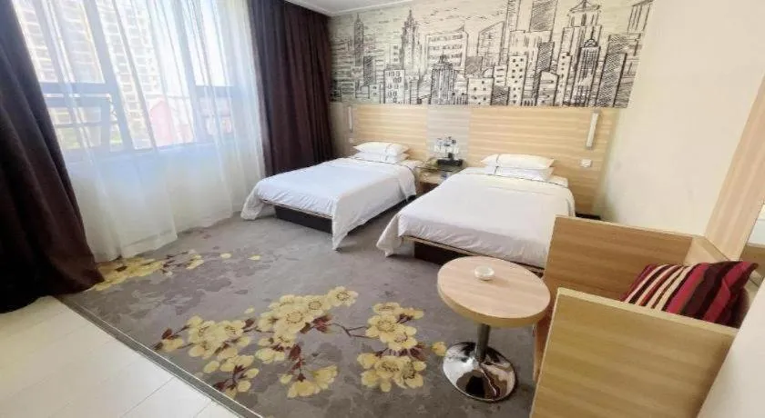 Bed in City Comfort Inn Huanggang Dongmen Road Wanda Plaza