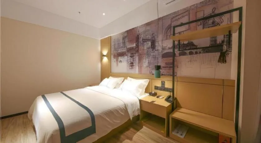Bed in City Comfort Inn Dongguan Tangxia Garden Street