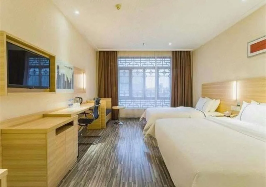 Bed in City Comfort Inn Zhuhai Hengqin Ocean Kingdom Huafa Shangdu