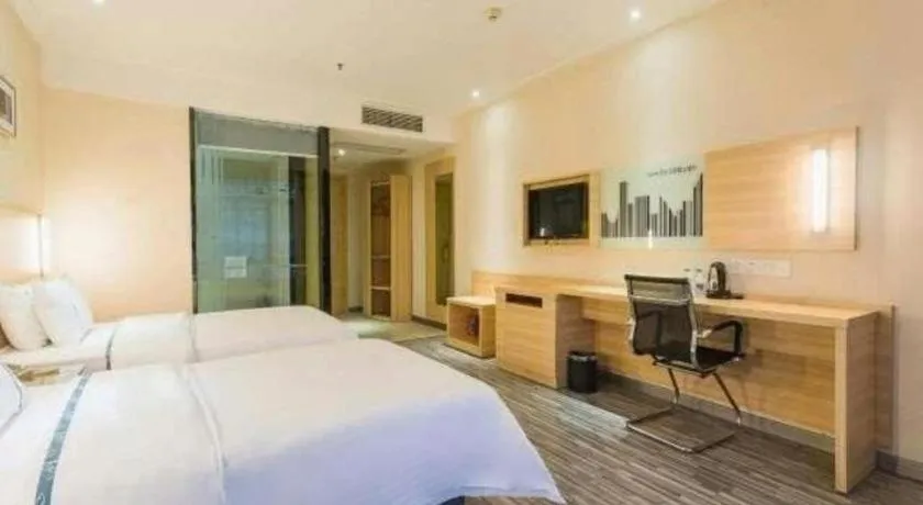 Bed in City Comfort Inn Zhuhai Hengqin Ocean Kingdom Huafa Shangdu