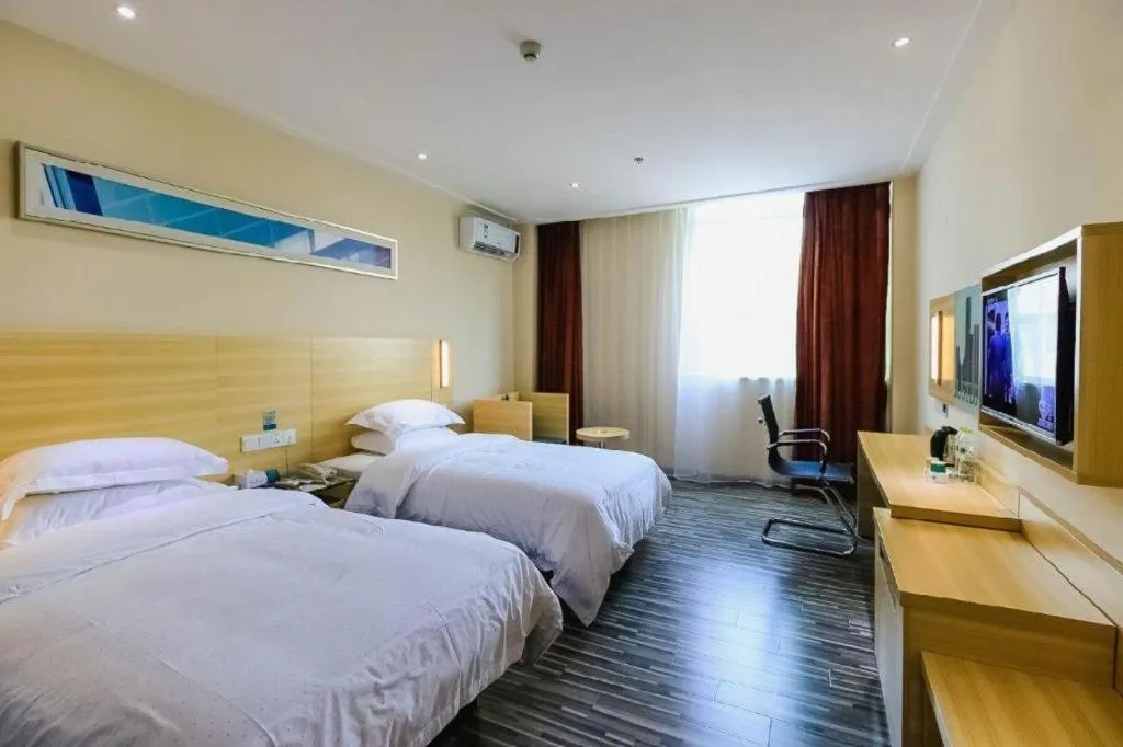 Bed in City Comfort Inn Zhuhai Hengqin Ocean Kingdom Huafa Shangdu