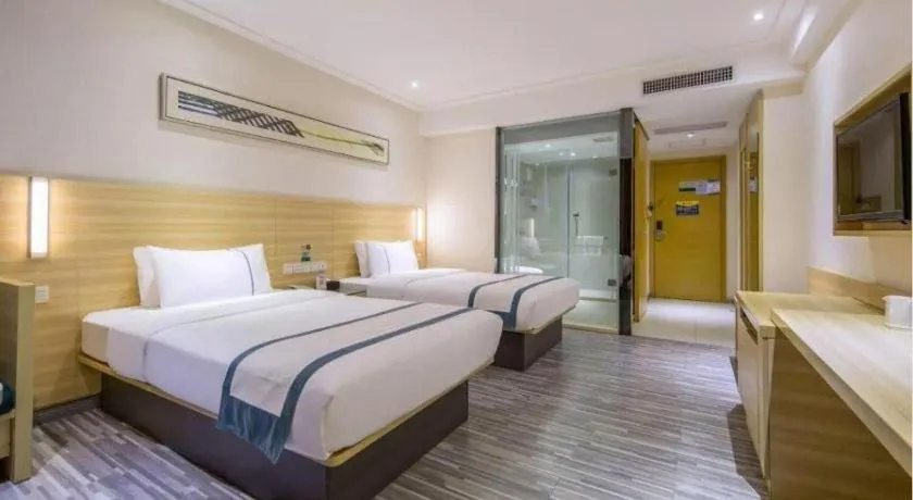 Bed in City Comfort Inn Zhuhai Hengqin Ocean Kingdom Huafa Shangdu